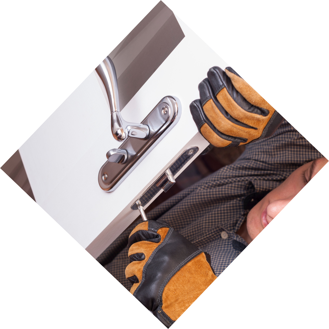 man working on door lock