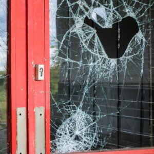 A glass door that is shattered 