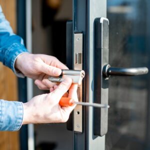 someone installing quality parts into a commercial door