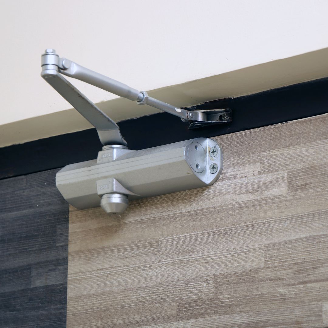 a mechanical door hinge
